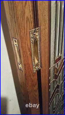 Pocket doors, Oak Custom made, Custom leaded glass and wood inlay with hardware